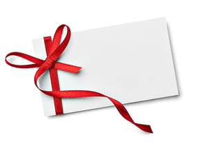 close up of a  note card with ribbon bow on white background